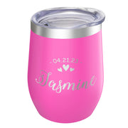 Pink insulated tumbler with 'Jasmine' and a date engraved on it, against a white background