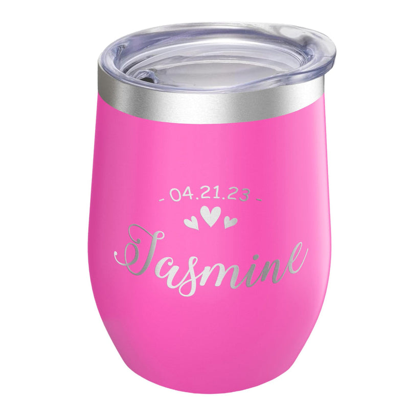 Pink insulated tumbler with 'Jasmine' and a date engraved on it, against a white background
