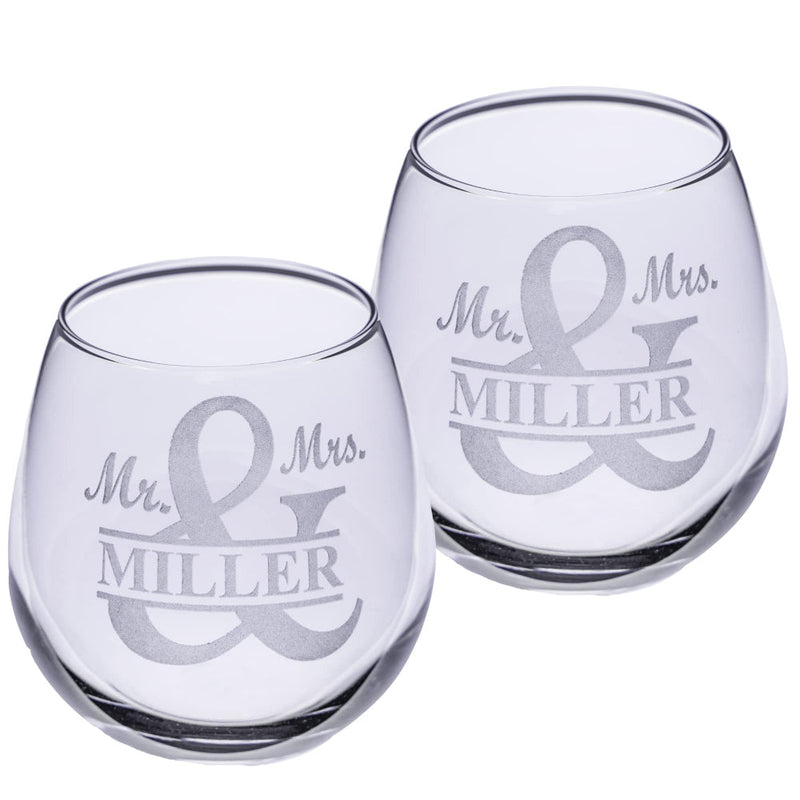 Two clear wine glasses with 'Mr. & Mrs. Miller' engraving on a white background