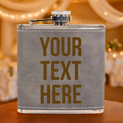 Gray flask with 'YOUR TEXT HERE' text on a blurred background