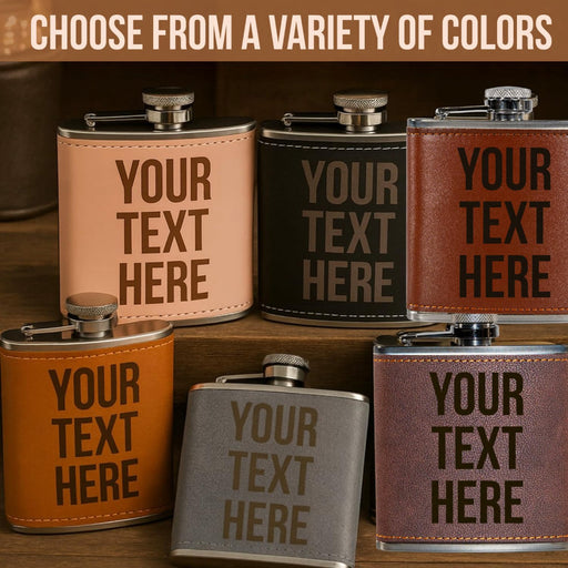 Set of customizable leather flasks with text placeholder on a wooden surface.