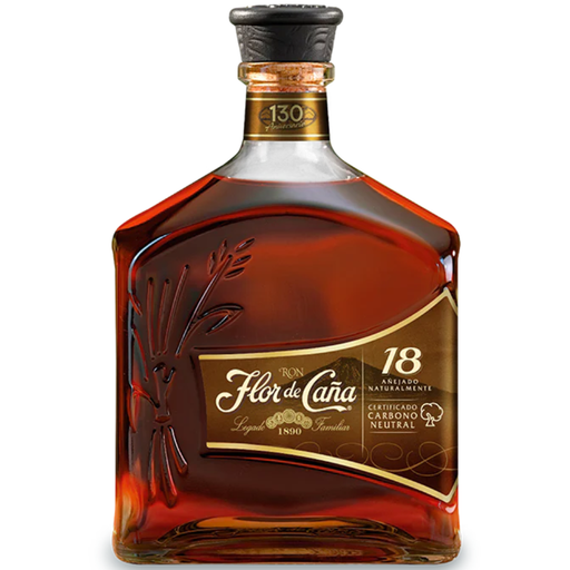 Flor de Caána 18-year-old rum bottle on a white background