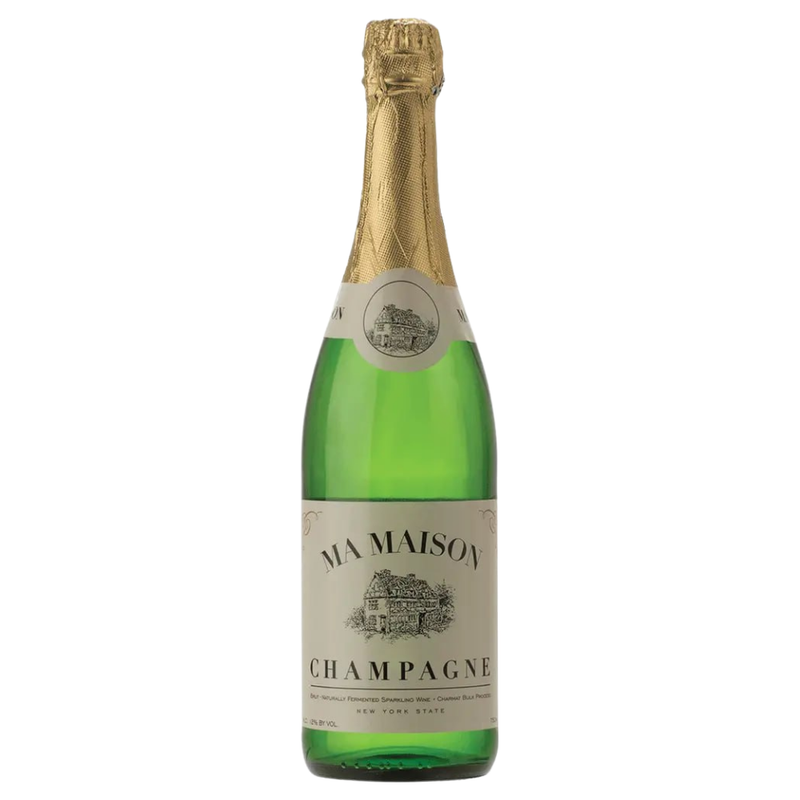 2_Ma Maison champagne bottle with gold foil cap on a white background