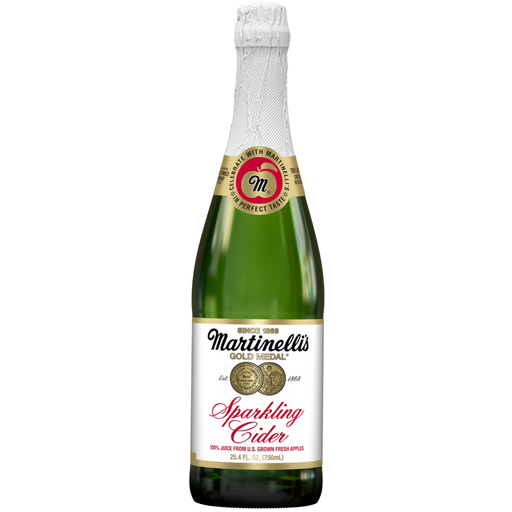 Green bottle of Martinelli's Sparkling Cider on a white background