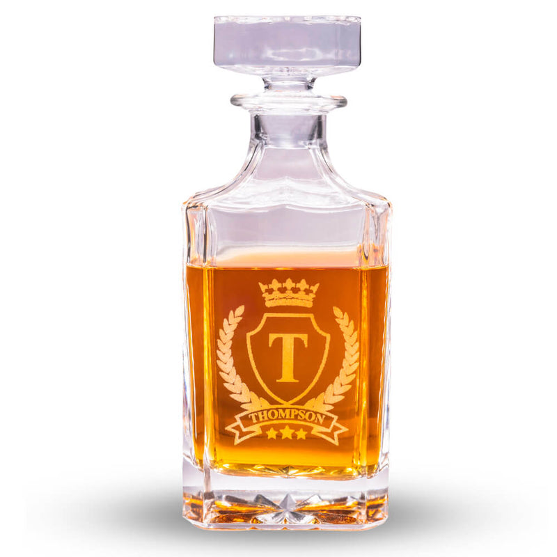 Glass decanter with a logo and the name 'Thompson' on a white background