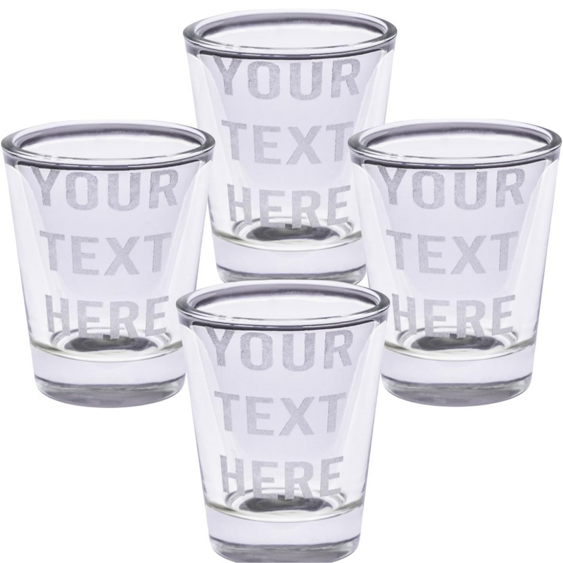 Set of four clear shot glasses with 'Your Text Here' text on a white background
